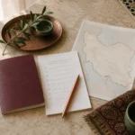 Illustrative Iran visa planning desk with a blank travel booklet, checklist and map