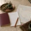 Illustrative Iran visa planning desk with a blank travel booklet, checklist and map